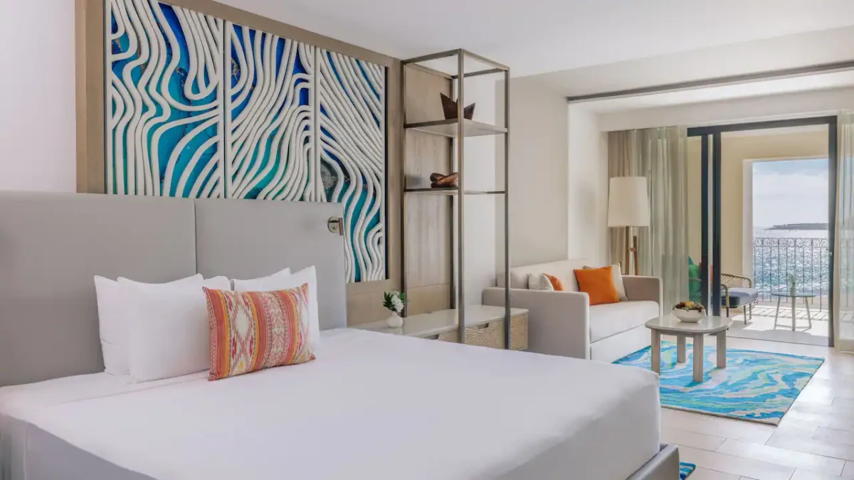 Deluxe Ocean View King room with king bed, sleeper sofa, private terrace, and partial Sea of Cortez views at Hyatt Ziva Los Cabos.
