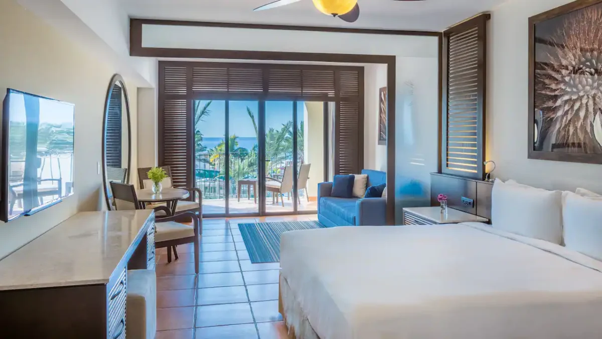 Ocean View Master King room with king bed, sleeper sofa, private terrace, and partial Sea of Cortez views at Hyatt Ziva Los Cabos.
