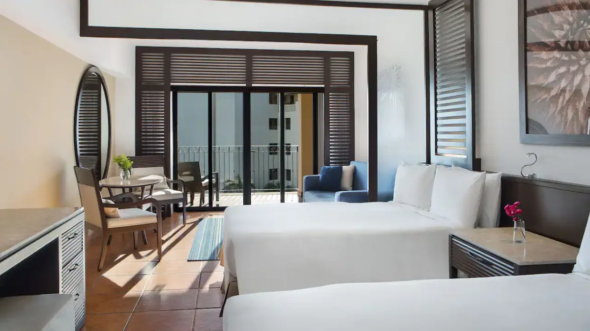 Resort View Master Double room with two double beds, sleeper sofa, and furnished terrace at Hyatt Ziva Los Cabos.