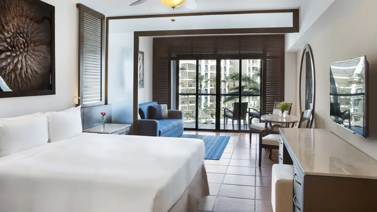 Resort View Master King room with king bed, sleeper sofa, and furnished terrace at Hyatt Ziva Los Cabos.