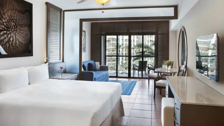Resort View Master King room with king bed, sleeper sofa, and furnished terrace at Hyatt Ziva Los Cabos.