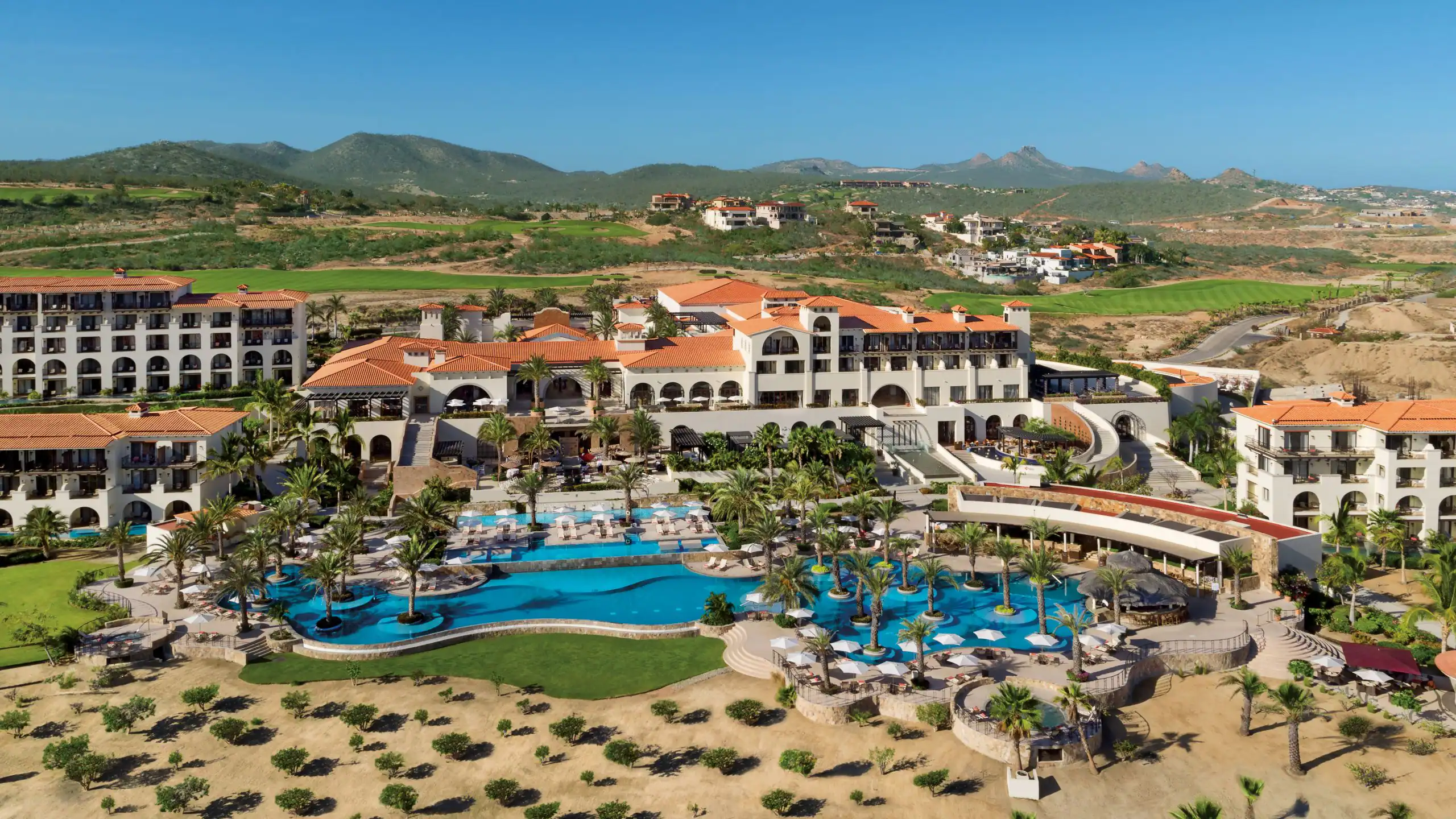 Secrets Puerto Los Cabos Golf and Spa Resort adults-only all-inclusive resort with oceanfront infinity pools, golf course access, and luxury spa in San José del Cabo, Mexico.