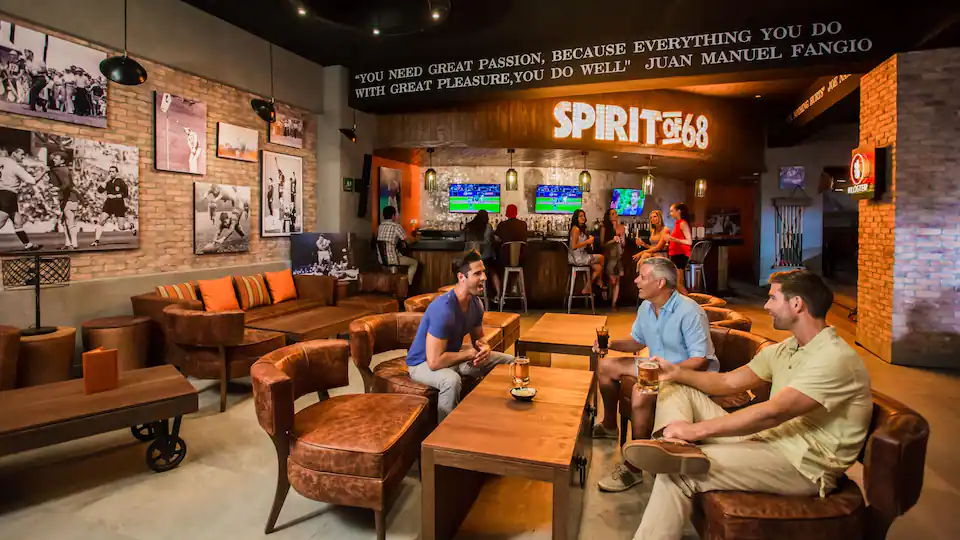 Spirit of 68 sports bar at Hyatt Ziva Los Cabos featuring a lively lounge atmosphere, large-screen TVs, and handcrafted cocktails.